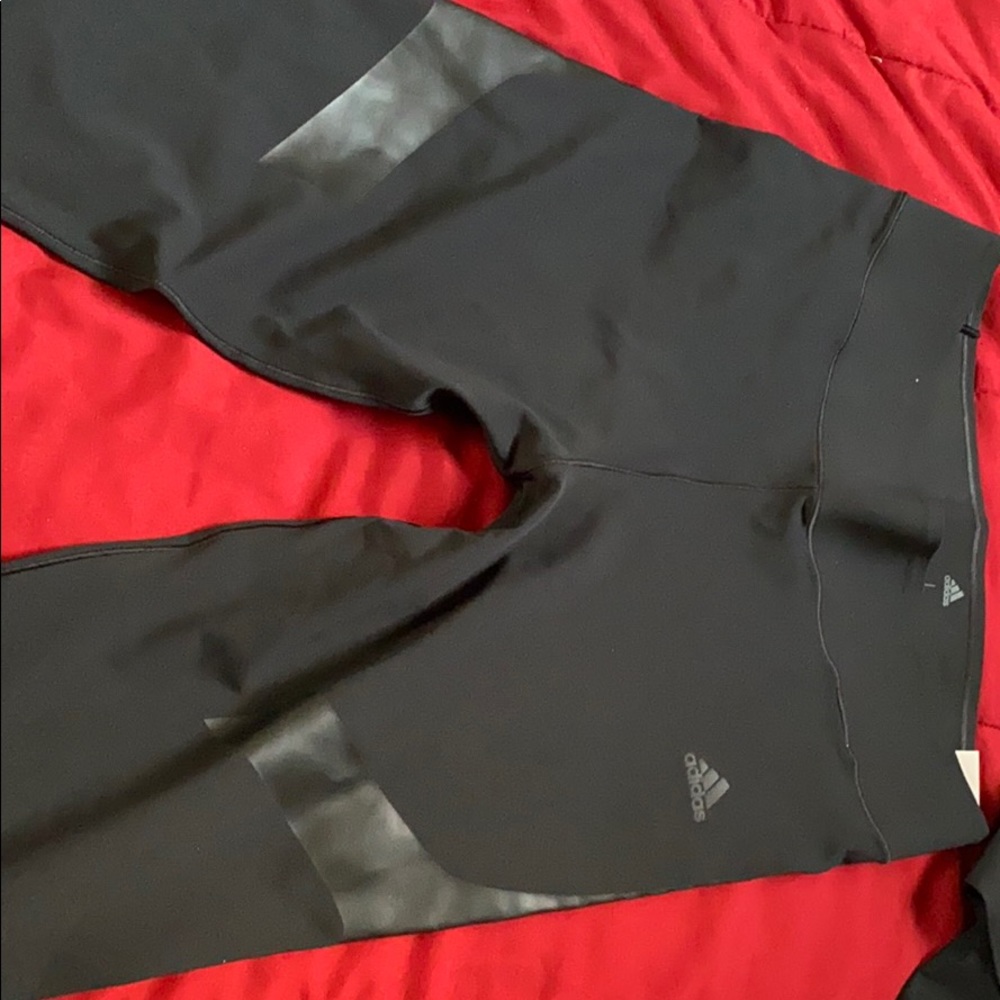 Never worn Men’s long leg training pants